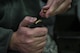 Master Sgt. Dennis Henry, 27th Special Operations Wing Public Affairs superintendent, loads ammunition into a clip before competing in the Pistol Excellence in Competition March 2, 2017, at Cannon Air Force Base, N.M. Competitors shot a total of 30 rounds at a target 25 yards away during three different timed rounds. (U.S. Air Force photo by Senior Airman Luke Kitterman/Released)