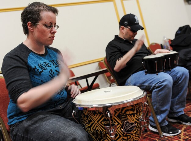 Air Force Wounded Warrior Trials participants play the drums during a Rock to Recovery practice session in Las Vegas, March 1, 2015. One slight deviation to the Rock to Recovery program unique to the AFW2 Trials is the band’s live performance at the games’ post-event banquet. (U.S. Air Force photo by Staff Sgt. Siuta B. Ika)