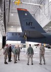Brig. Gen. Ferdinand Stoss, Air Force Global Strike Command director of operations, speaks with 5th Maintenance Group leadership at Minot Air Force Base, N.D., Feb. 27, 2017. Stoss visited Dock 8 and saw Airmen performing phase maintenance on a B-52H Stratofortress. (U.S. Air Force photo/Senior Airman J.T. Armstrong)