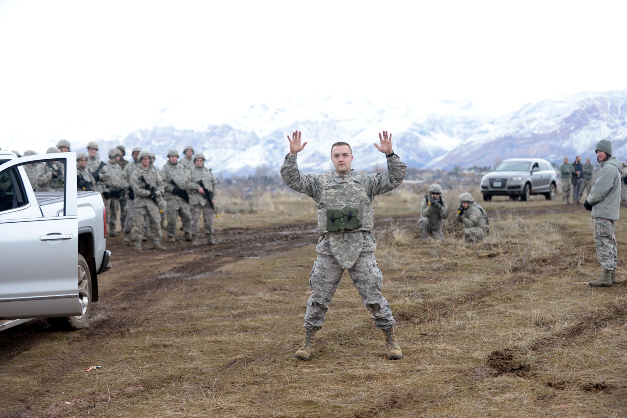 Maj. Jonathan Schisler, 729th Air Control Squadron, plays a role in vehicle challenge and response procedures at an Entry Control Point during a Feb. 22 training exercise at Hill Air Force Base. (U.S. Air Force photo by Todd Cromar)