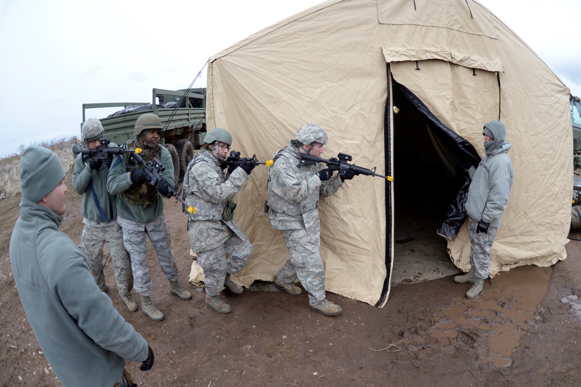 Airmen of the 729th Air Control Squadron practice room clearing procedures during an expeditionary training exercise at Hill Air Force Base’s ‘North 40’ training area. (U.S. Air Force photo by Todd Cromar)