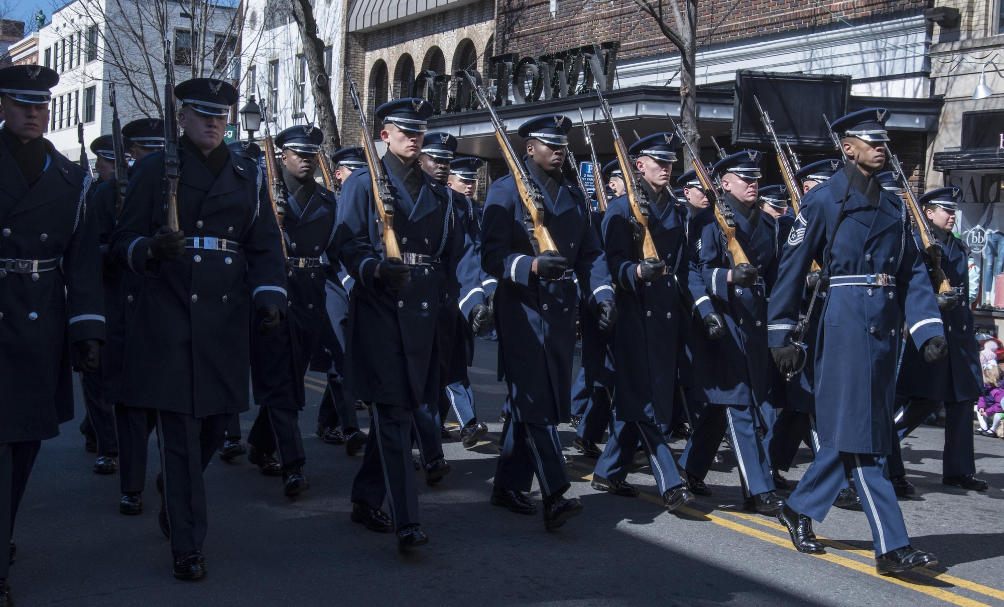 The U.S. Air Force Honor Guard marches in the 2017 Saint Patrick’s Day Parade in Alexandria, Va., March 4, 2017. The flight was composed of approximately 25 Airmen who serve to promote the Air Force mission by showcasing drill performances to recruit, retain and inspire. (U.S. Air Force photo by Senior Airman Jordyn Fetter)