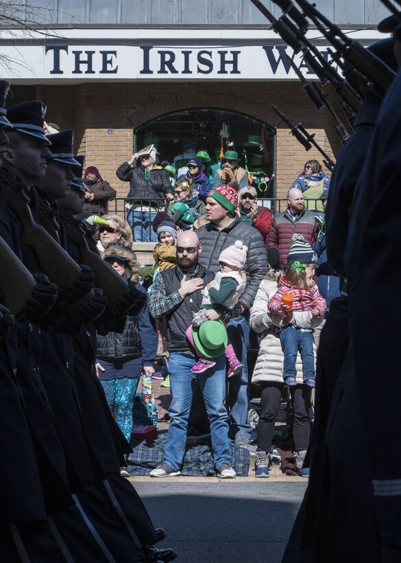 Audience members watch the U.S. Air Force Honor Guard march in the 2017 Saint Patrick’s Day Parade in Alexandria, Va., March 4, 2017. The group marched alongside the Army, Navy, Coast Guard and Marine honor guards for the half-mile-long parade. (U.S. Air Force photo by Senior Airman Jordyn Fetter)