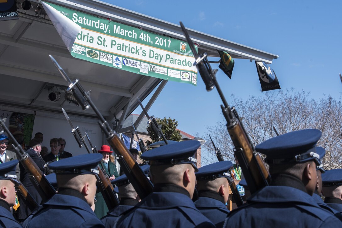 The U.S. Air Force Honor Guard marches past a musical performing stage during the 2017 Saint Patrick’s Day Parade in Alexandria, Va., March 4, 2017. The flight was composed of approximately 25 Airmen who serve to promote the Air Force mission by showcasing drill performances to recruit, retain and inspire. (U.S. Air Force photo by Senior Airman Jordyn Fetter)