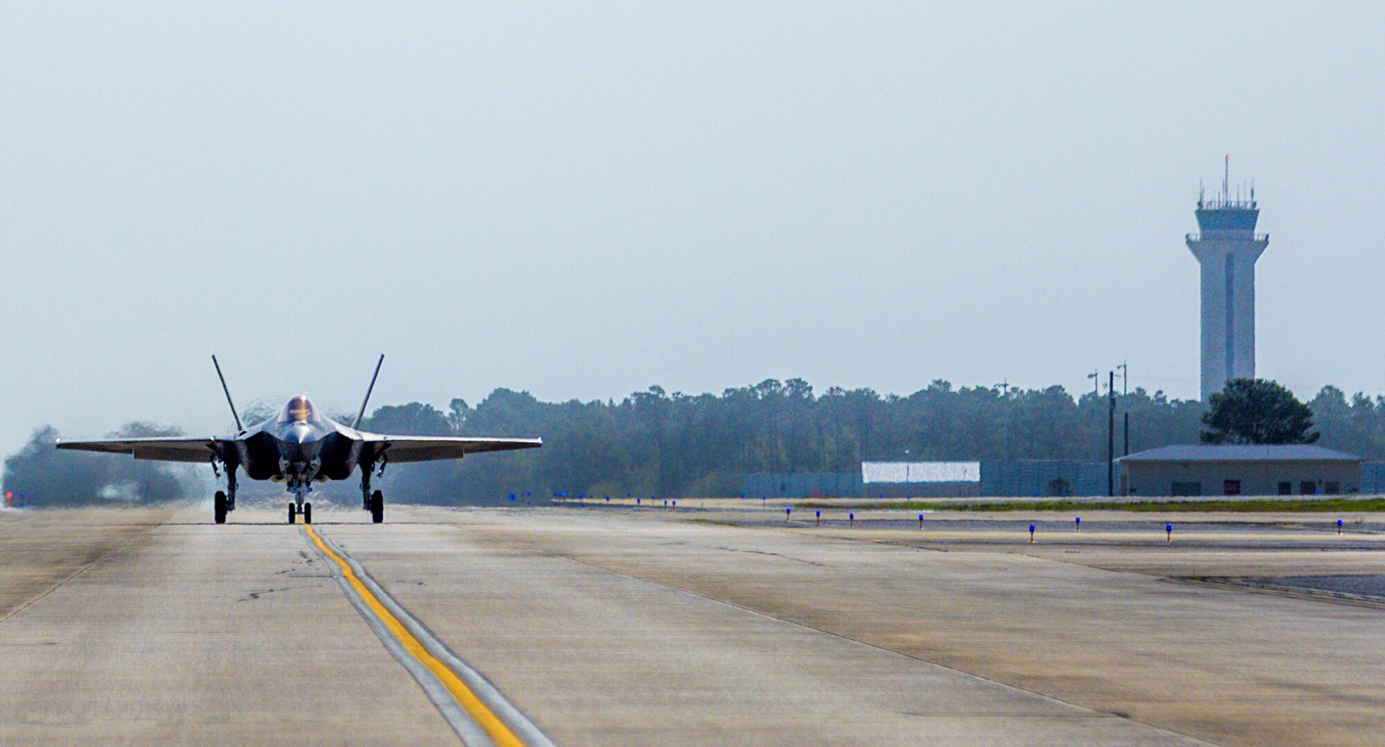 An F-35C Lightning II taxis down the flight line Feb. 27 from the Strike Fighter Squadron 101 at Eglin Air Force Base, Fla. The F-35C variant is a carrier-capable low-observable multi-role fighter aircraft, designed to provide unmatched airborne power projection from the sea. The Navy's joint strike fighter bears structural modifications from the other variants, necessitated by the increased resiliency required for carrier operations. (U.S. Air Force photo/Kristin Stewart)