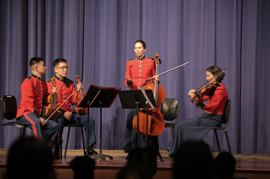On March 6, 2017, a Marine string quartet performed a Music in the High Schools presentation at Laurel High School in Laurel, Md. At the conclusion, one of the students exclaimed, "We need to sound like them!" (U.S. Marine Corps photo by Master Sgt. Kristin duBois/released)