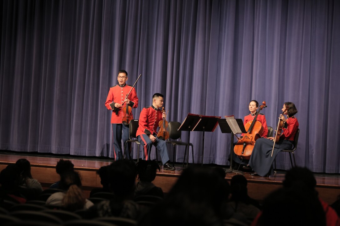 On March 6, 2017, a Marine string quartet performed a Music in the High Schools presentation at Laurel High School in Laurel, Md. At the conclusion, one of the students exclaimed, "We need to sound like them!" (U.S. Marine Corps photo by Master Sgt. Kristin duBois/released)