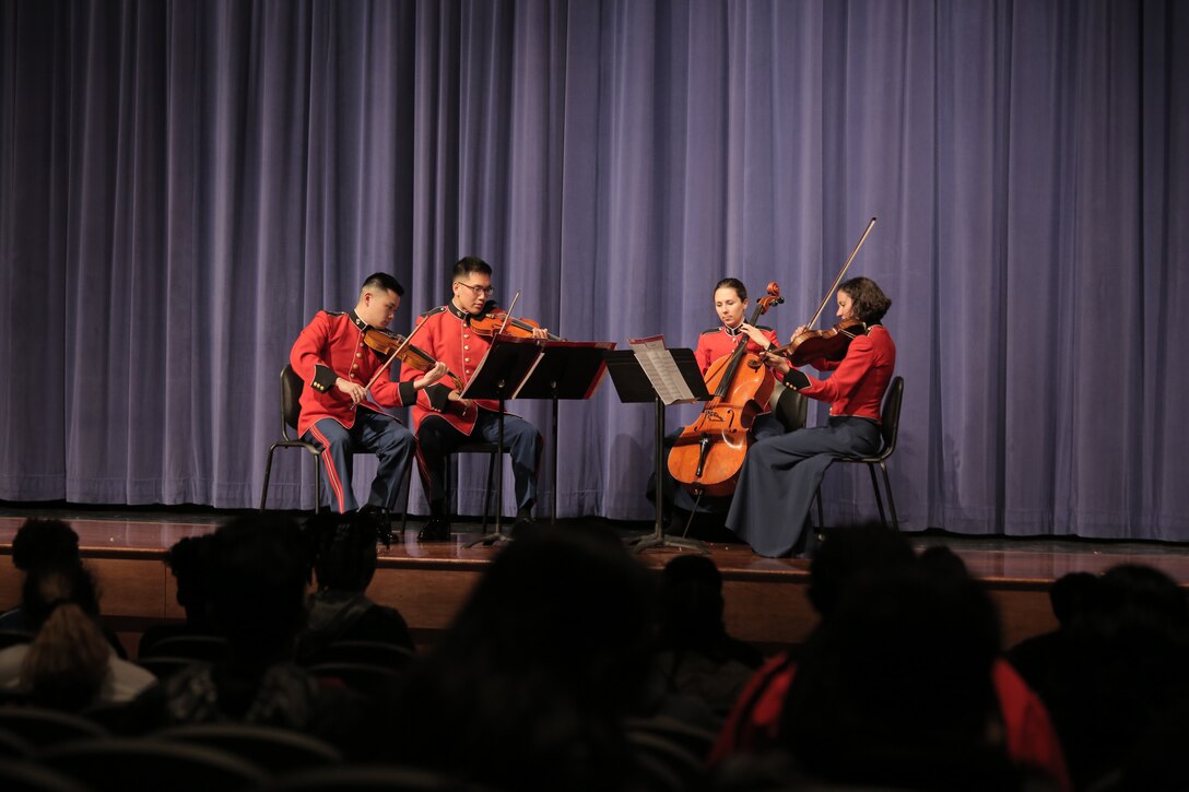 On March 6, 2017, a Marine string quartet performed a Music in the High Schools presentation at Laurel High School in Laurel, Md. At the conclusion, one of the students exclaimed, "We need to sound like them!" (U.S. Marine Corps photo by Master Sgt. Kristin duBois/released)