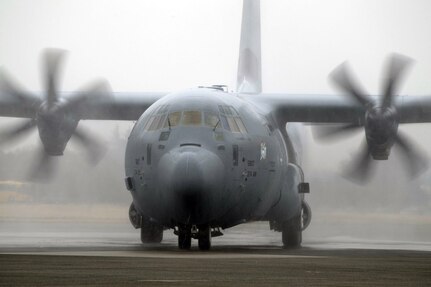 A C-130J Super Hercules with the 36th Airlift Squadron is drenched in water during a water salute upon arrival at Yokota Air Base, Japan, March 6, 2016. Much like its H-model older brother, the C-130J will be used to support critical peacekeeping and contingency operations in the Indo-Asia Pacific region, including cargo delivery, troop transport, airdrop and aeromedical missions.  