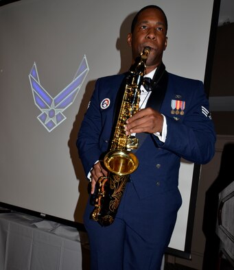 Senior Airman Bobby Lucas of the 45th Space Wing plays the national anthem on his saxophone during the Space Coast Chief Master Sergeant Recognition Ceremony in Cocoa Beach, Florida, March 3, 2017. The special event recognized 13 Airmen and one Coast Guardsman for their transition to the highest enlisted rank of chief master sergeant. (U.S. Air Force photo/Senior Airman Brandon Kalloo Sanes)