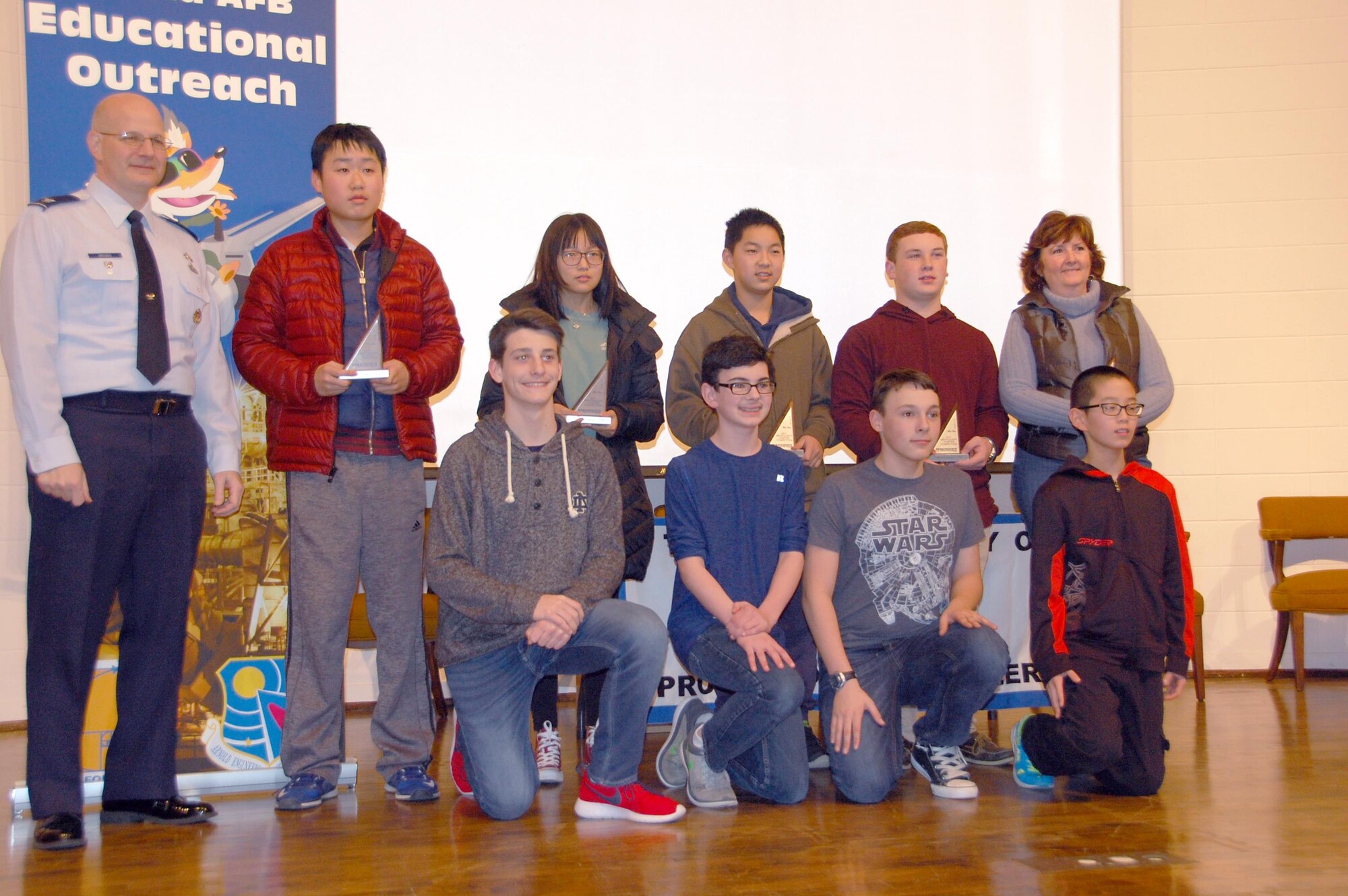 Pictured here are the mathletes who will represent the Tullahoma Chapter at the Tennessee MATHCOUNTS® competition. The team is composed of the members from the winning teams at the MATHCOUNTS competition Jan. 28 at the University of Tennessee Space Institute and the four top scoring individuals not on the winning team. The competition challenges mathletes to solve problems. Shown from left and back row is AEDC chief of Test Systems Sustainment, Col. Raymond Briggs; The Webb School team members, Nicky Dai, Zia Wang, Nathan Xing, Barret Melson; MATHCOUNTS Coach, Lea Anne Windham, from The Webb School; front row, East Middle School student Kyler Parker; West Middle School student Preston McGee; and East Middle School students Jake Bennett and Franklin Zhang. (Courtesy photo)
