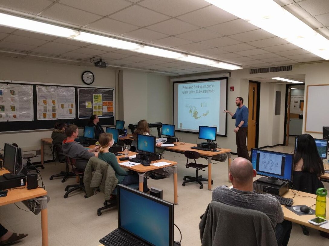 Michael Voorhees delivers a lecture about sediment transport modeling to a class at Buffalo State College.