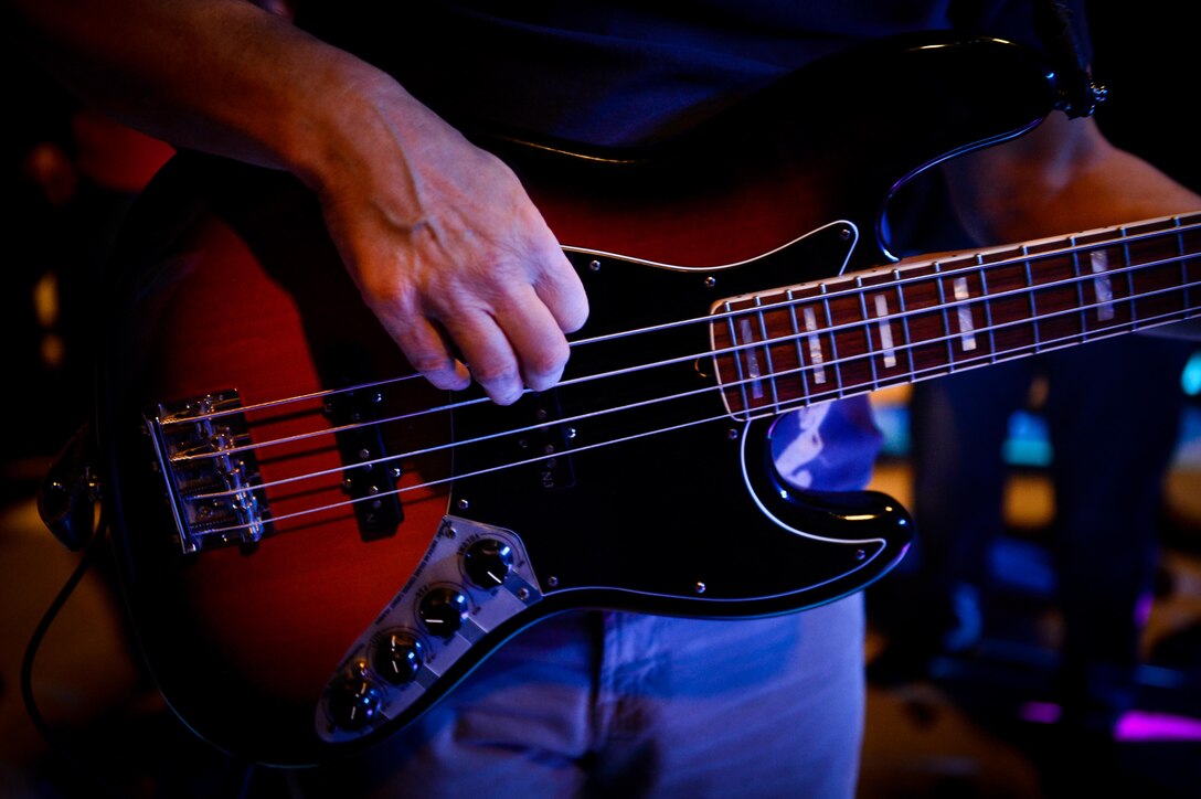 Gary Sinise, the Lt. Dan Band electric bass player, plays off stage at Barksdale Air Force Base, La. March 3, 2017. This is the first time the Lt. Dan Band performed at Barksdale. (U.S. Air Force photo/Airman 1st Class Stuart Bright)