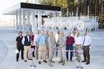 AEDC Test Support Division Chief Col. Eric Leshinsky (center left) and AEDC Commander Col. Rodney Todaro (center right) cut the ribbon during the Ribbon Cutting ceremony for the construction completion of the Arnold AFB Ground Vehicle Fueling Facility Nov. 16, 2016. The facility recently opened for business providing regular unleaded gasoline and diesel fuel for government vehicles at the Complex. Pictured with Leshinsky and Todaro are team members who worked on the project. (U.S. Air Force photo/Rick Goodfriend)