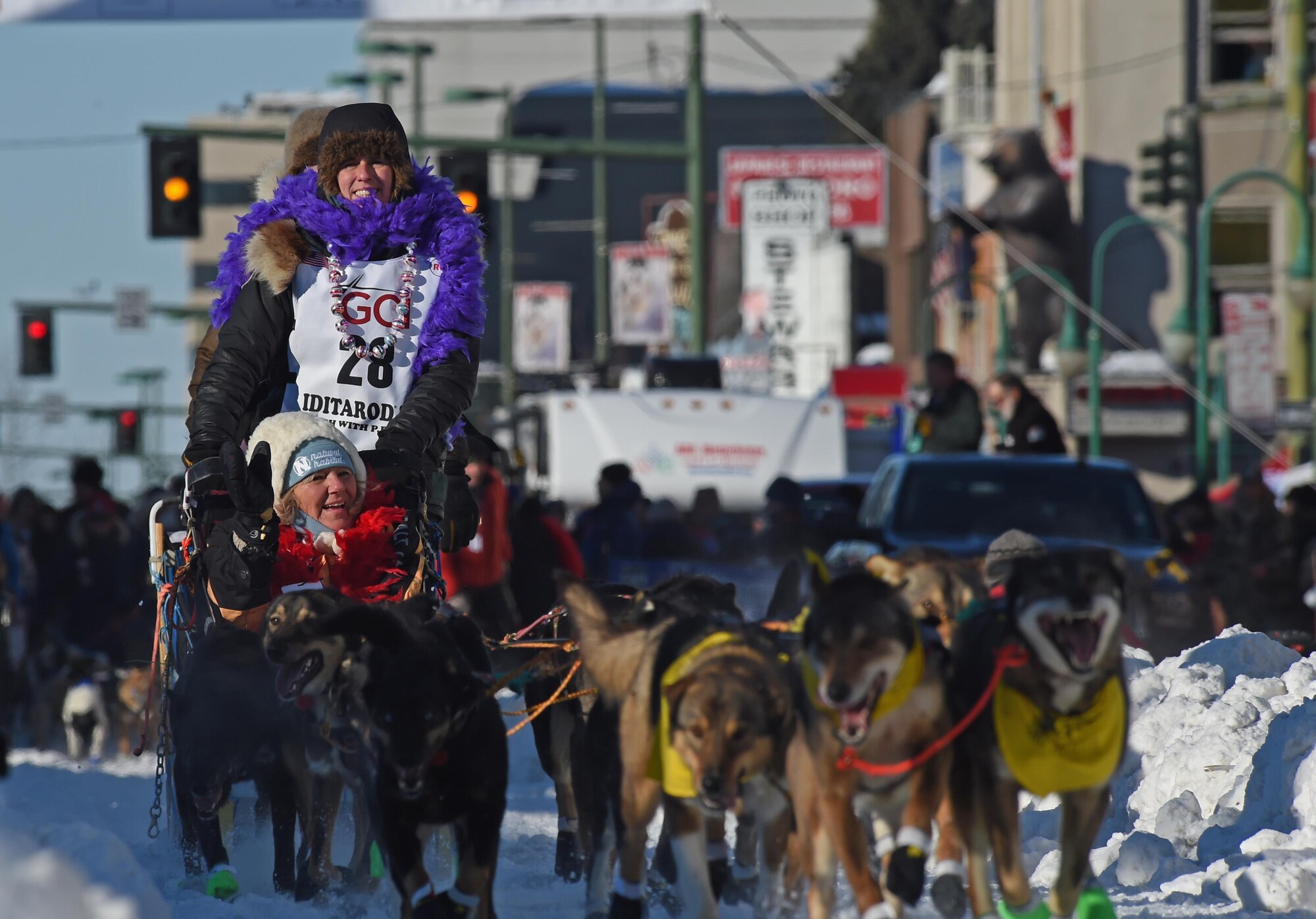 Jodi Bailey, an Iditarod musher, rides down 4th avenue during the 45th annual Iditarod Trail Sled Dog Race in Anchorage, Alaska, March 4, 2017. More than 1,150 dogs pulled 72 mushers for the day’s 11 mile run to Campbell Airstrip. 