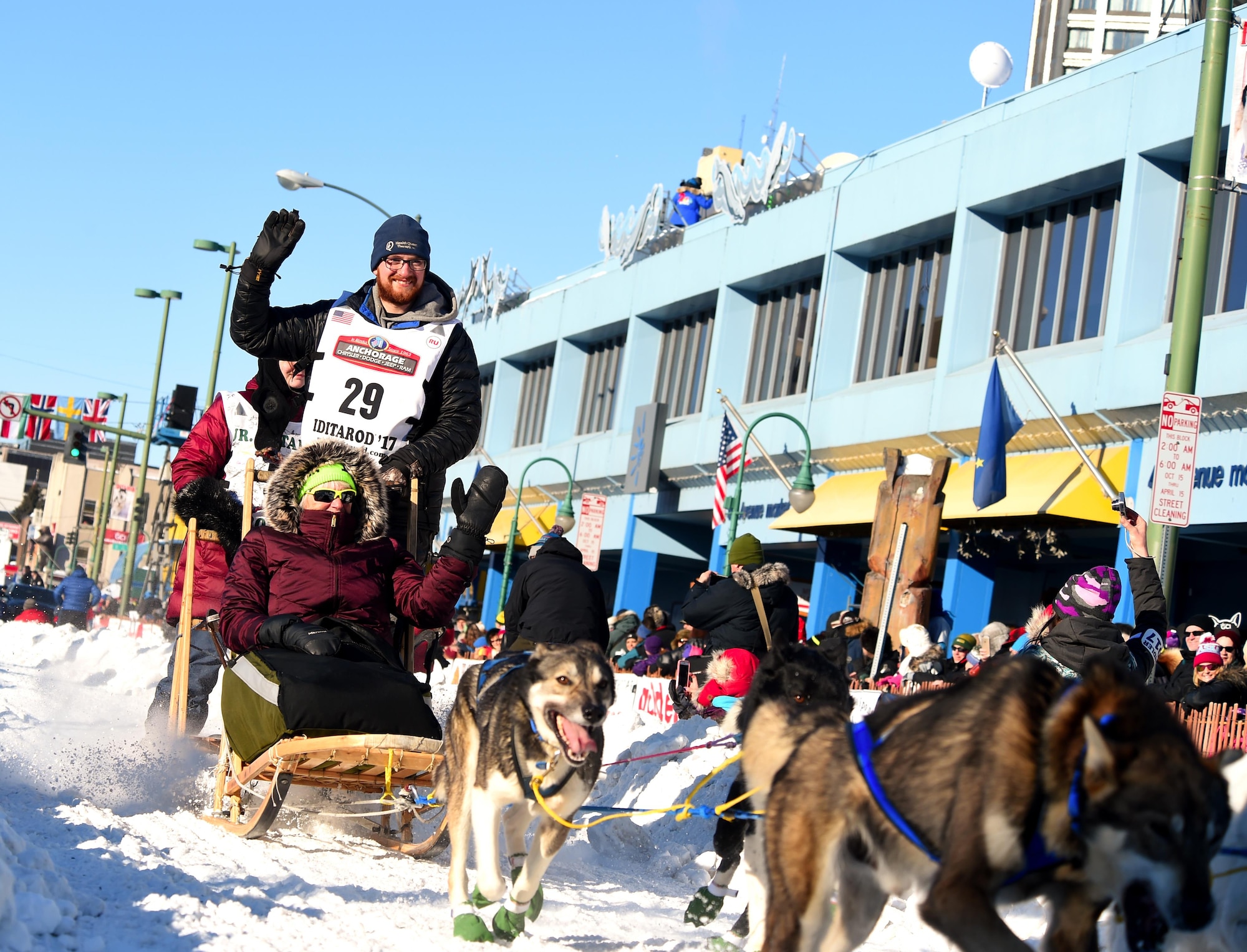 Wade Marrs, an Iditarod musher, waves at fans and spectators at the 45th annual Iditarod Trail Sled Dog Race in Anchorage, Alaska, March 4, 2017. More than 1,150 dogs pulled 72 mushers for the day’s 11 mile run to Campbell Airstrip.