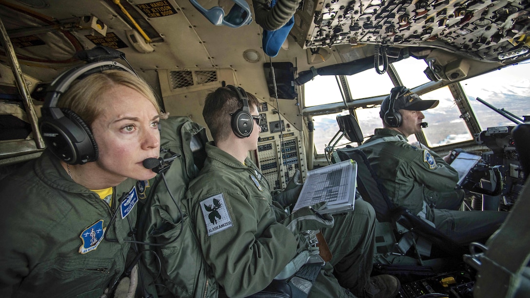 An Alaska Air National Guard crew flies a C-130 Hercules aircraft on the unit’s final flight with the aircraft over Joint Base Elmendorf-Richardson, Alaska, March 4, 2017. The crew is assigned to the Alaska Air National Guard's 144th Airlift Squadron. Air National Guard photo by Staff Sgt. Edward Eagerton 