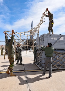 Afghan Air Force C-130H aircrew and maintainers palletize cargo at Shindand Air Wing, Herat, Afghanistan, for transportation to Kabul Air Wing, March 1, 2017. The cargo consisted of 9,000 pounds of Mi-17 parts to be reused for maintenance overhaul. (U.S. Air Force photo by Tech. Sgt. Veronica Pierce)