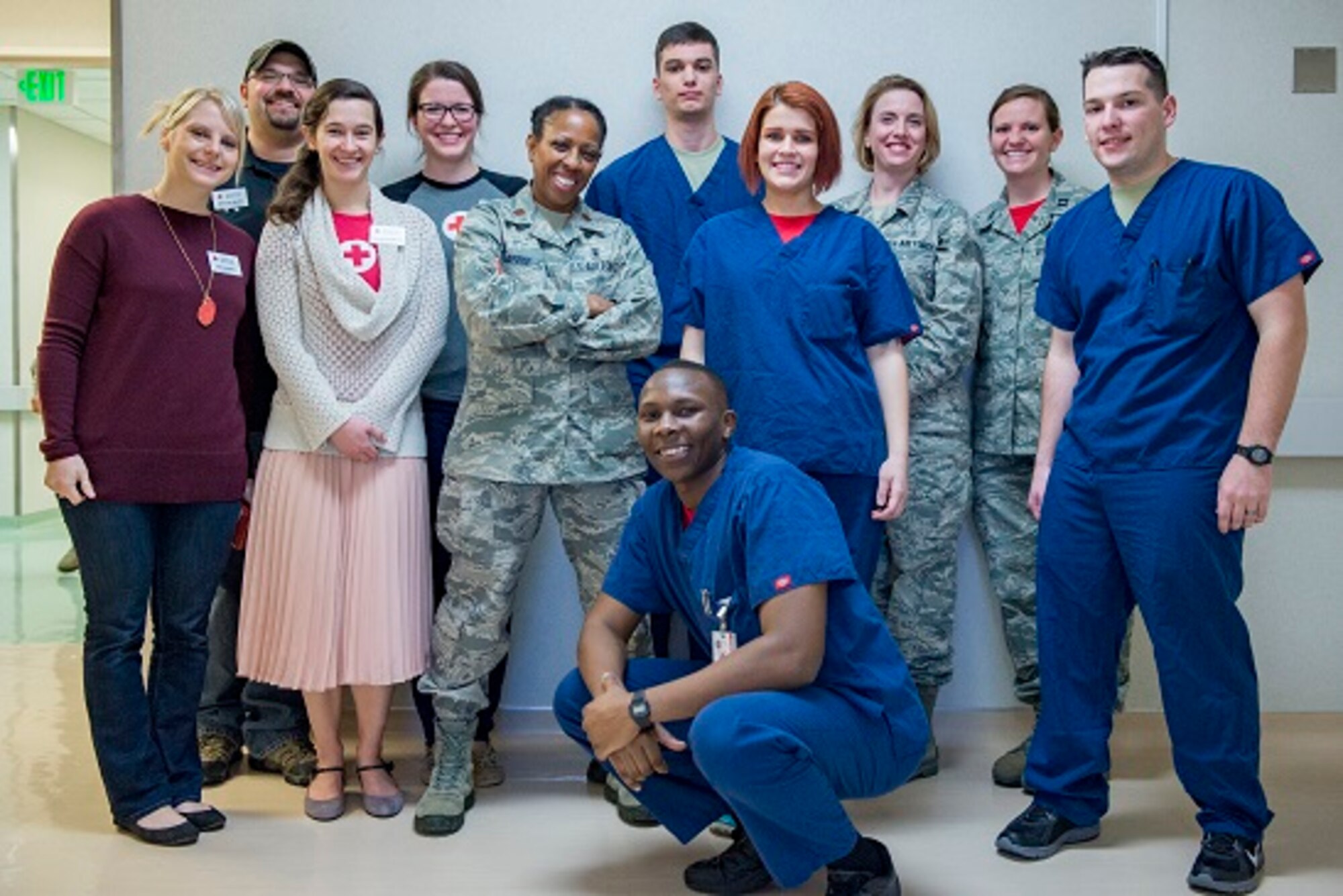 Members of Yokota’s medical staff and Red Cross pose for a photo before the ribbon cutting ceremony of the new lactation room, Mar. 3, 2017, at Yokota Air Base, Japan. The staff started work on the new room for new mothers in Dec. 2016. (U.S. Air Force photo by Airman 1st Class Donald Hudson)
