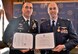 Pa. National Guard Director of the Joint Staff Army Col. David Wood,  Fort Indiantown Gap, Pa., stands for a photo while awarding Air Force Lt. Col. Adam Colombo, 111th Attack Wing chief of aerospace medicine, Horsham Air Guard Station, Pa. with the citation for the Major Octavius V. Catto Medal during a ceremony held at The Union League of Philadelphia, Philadelphia, Feb. 25. Originally created in the 1880's, the award mysteriously disappeared without record; then in 2011, it was approved for re-introduction into the Commonwealth's military decorations system. (U.S. Air National Guard photo by Tech. Sgt. Andria Allmond)
