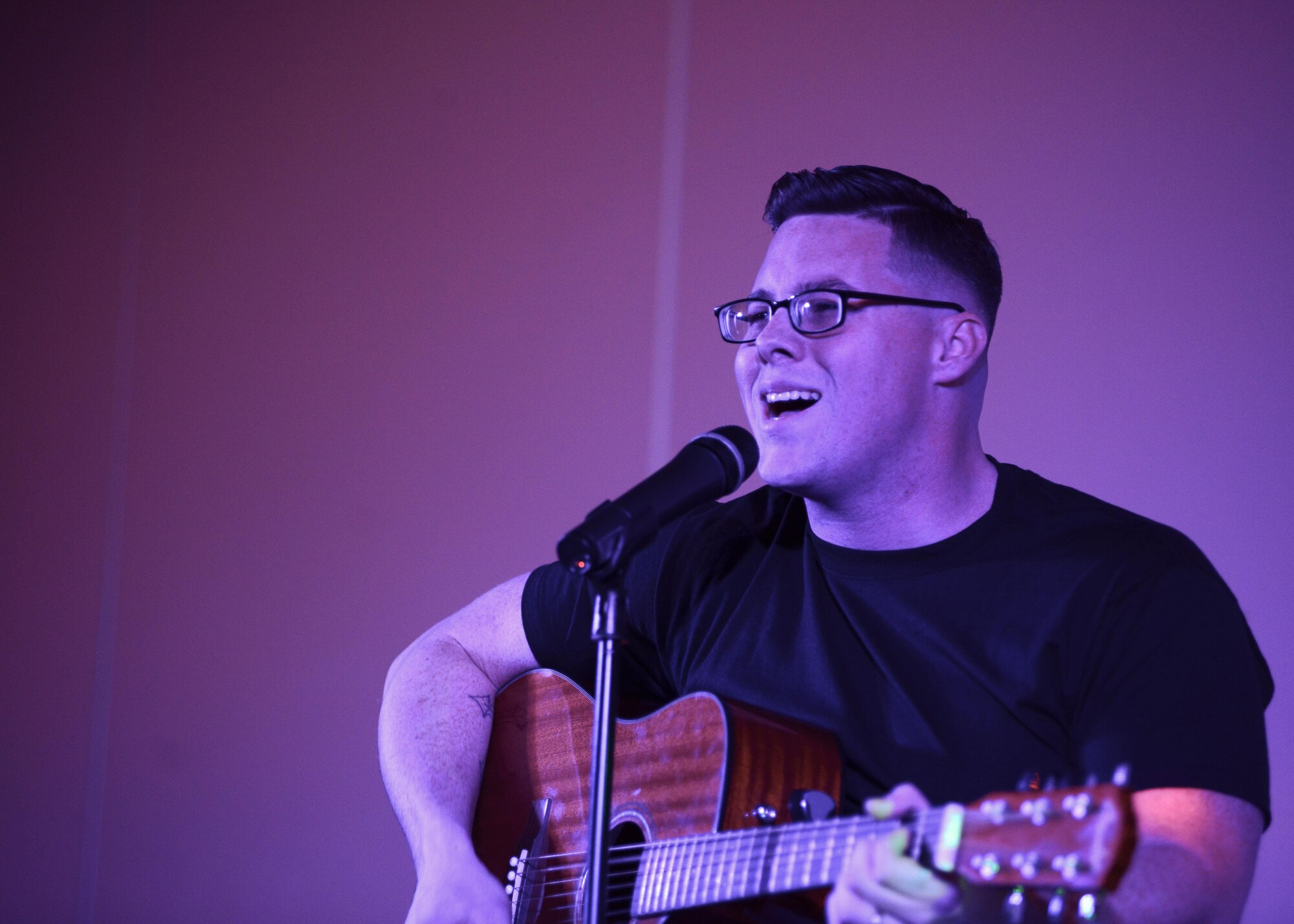 Staff Sgt. Michael Keesucker performs during the Aviano’s Got Talent finale, March 2, 2017, at Aviano Air Base, Italy. Keesucker was one of five performers in the finale. (U.S. Air Force photo by Airman 1st Class Ryan Brooks)