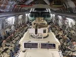 Airmen assigned to the 105th Base Defense Squadron fly on a 105th Airlift Wing C-17 Globemaster III to Avon Park Range, Florida to participate in a Mission Readiness Exercise. The Airmen lived in field conditions for nearly two weeks while honing critical skills. 