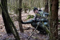 A U.S. Air Force pilot assigned to the 480th Fighter Squadron puts a thumb up signaling it’s clear to proceed during Survival, Evasion, Resistance and Escape training near Spangdahlem Air Base, Germany, March 3, 2017. The training was a SERE refresher course and is required of all aircrew personnel. (U.S. Air Force photo by Airman 1st Class Preston Cherry)