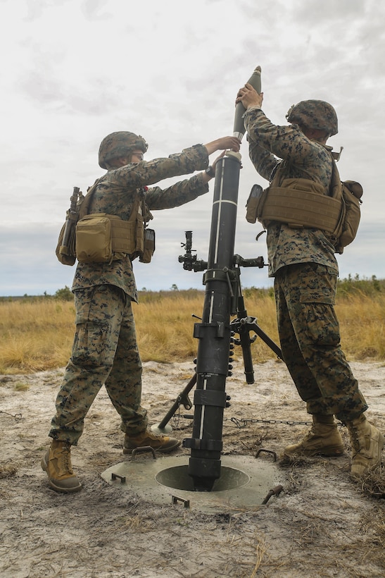 Marines with Task Force Southwest prepare to fire an 81mm mortar during a live-fire exercise at Camp Lejeune, N.C., March 2, 2017. The unit executed a full mission rehearsal from Feb. 27 to March 3, allowing the Marines to build their advisory and combat skills prior to a deployment to Helmand Province, Afghanistan. Task Force Southwest is comprised of approximately 300 Marines, whose mission will be to train, advise and assist the Afghan National Army 215th Corps and 505th Zone National Police. (U.S. Marine Corps photo by Sgt. Lucas Hopkins)