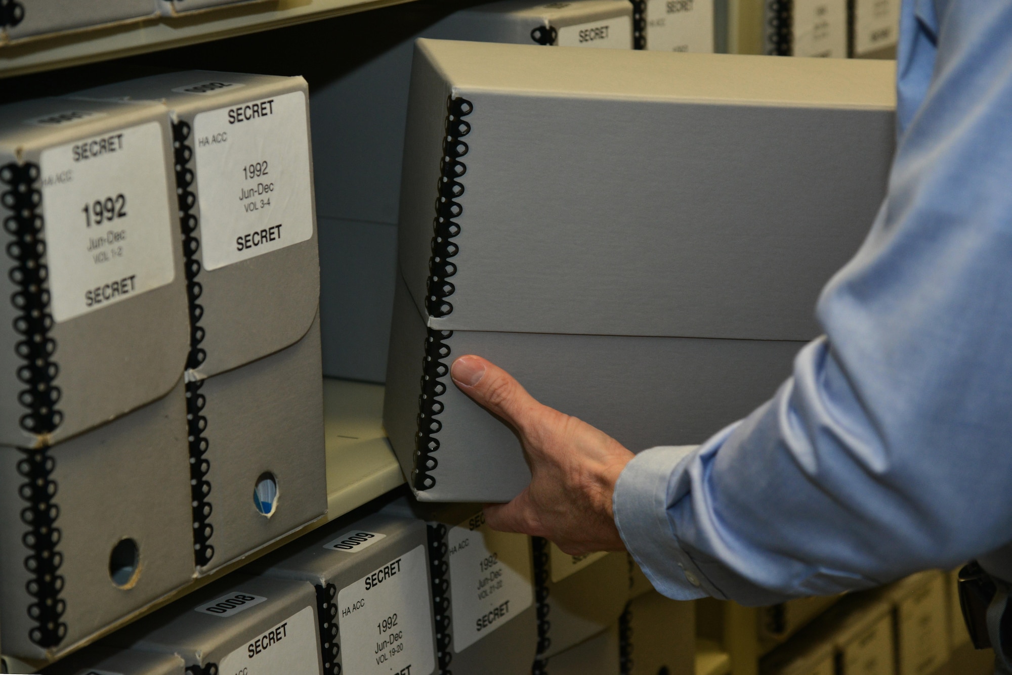 Bill Butler, Air Combat Command deputy command historian, returns records to their archives at Joint Base Langley-Eustis, Va., Jan. 24, 2017. Information inside the archives contain what decisions made by leadership, what the results were and how it affected their respective unit. (U.S. Air Force photo by Airman 1st Class Tristan Biese)