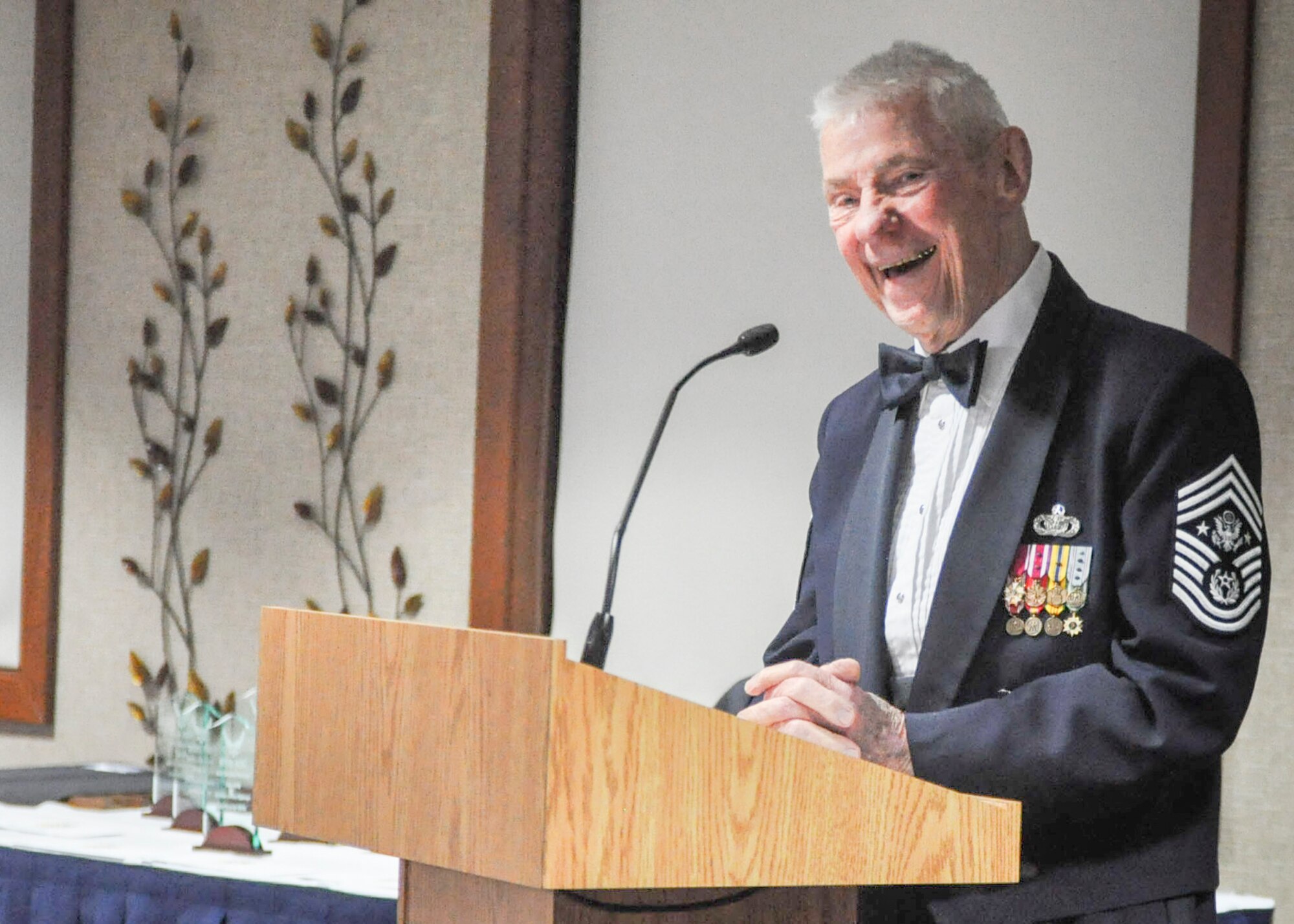 Retired Chief Master Sgt. of the Air Force (CMSAF) Robert D. Gaylor gives remarks as the guest speaker at the 910th Airlift Wing's annual awards banquet here, March 4, 2017. Gaylor was the fifth CMSAF from 1977 to 1979. As the guest speaker, Gaylor spoke of three main qualities that make a winner: opportunity, aptitude and attitude. The event recognized Airmen of outstanding service. (U.S. Air Force photo/Senior Airman Joshua Kincaid)