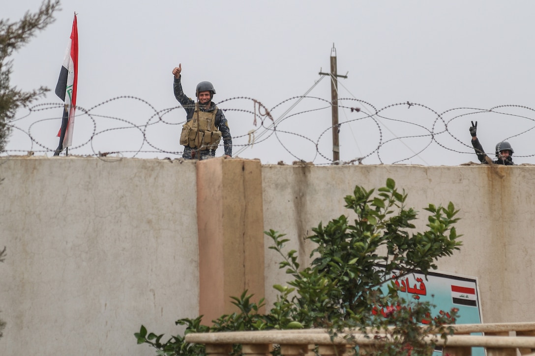 Iraqi federal police greet U.S. Army advisors before a key leader engagement near West Mosul, Iraq, March 2, 2017. The breadth and diversity of partners supporting the Coalition demonstrate the global and unified nature of the endeavor to defeat ISIS. Combined Joint Task Force-Operation Inherent Resolve is the global Coalition to defeat ISIS in Iraq and Syria. (U.S. Army photo by Staff Sgt. Jason Hull)