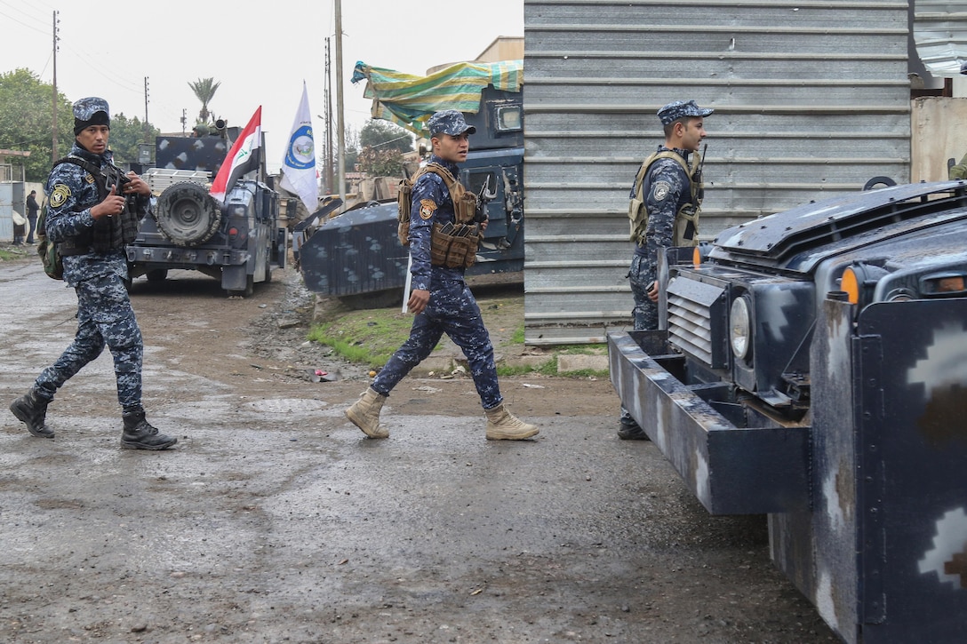 Iraqi federal police conduct operations to liberate and secure West Mosul, Iraq, March 2, 2017. The breadth and diversity of partners supporting the Coalition demonstrate the global and unified nature of the endeavor to defeat ISIS. Combined Joint Task Force-Operation Inherent Resolve is the global Coalition to defeat ISIS in Iraq and Syria. (U.S. Army photo by Staff Sgt. Jason Hull)