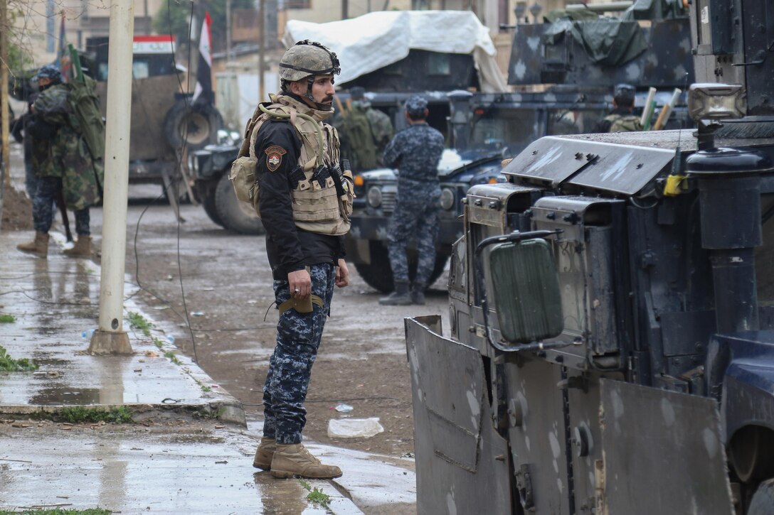 Iraqi federal police conduct operations to liberate and secure West Mosul, Iraq, March 2, 2017. The breadth and diversity of partners supporting the Coalition demonstrate the global and unified nature of the endeavor to defeat ISIS. Combined Joint Task Force-Operation Inherent Resolve is the global Coalition to defeat ISIS in Iraq and Syria. (U.S. Army photo by Staff Sgt. Jason Hull)