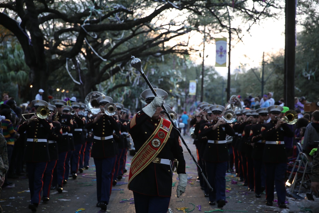 Gunnery Sgt. Aaron Goldin leads the 2nd Marine Aircraft Wing through a confetti and bead filled street during a parade in New Orleans, Feb. 26, 2017. The band was in multiple parades for the Mardi Gras celebrations and provided music for the spectators. They played classic Mardi Gras songs such as “Bourbon Street” and “Rampart Street Parade.” (U.S. Marine Corps photo by Lance Cpl. Cody Lemons/Released)