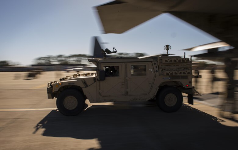 U.S. Air Force Airmen from the 24th Special Operations Wing drive off an MC-130J during a static load training event at Exercise Emerald Warrior at Hurlburt, Fla., Feb. 26, 2017.  Emerald Warrior is the largest joint special operations exercise. U.S. Special Operations Command forces train to respond to various threats across the spectrum of conflict. (U.S. Air Force photo by Senior Airman Erin Piazza)