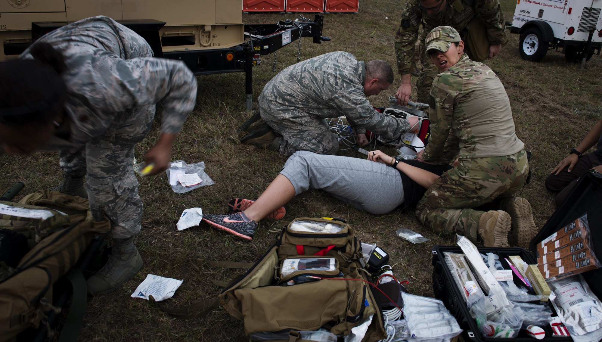 U.S. Air Force members of a Special Operations Forces Medical Element team and En-Route Patient Staging System 10 team respond to a medical emergency during Exercise Emerald Warrior 17 at Hurlburt Field, Fla., Feb. 28, 2017. Emerald Warrior is a U.S. Special Operations Command exercise during which joint special operations forces train to respond to various threats across the spectrum of conflict. (U.S. Air Force photo by Senior Airman Clayton Cupit)