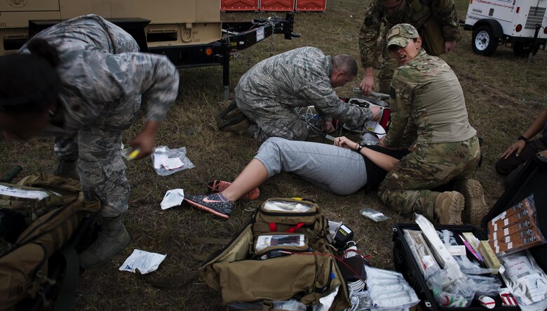 U.S. Air Force members of a Special Operations Forces Medical Element team and En-Route Patient Staging System 10 team respond to a medical emergency during Exercise Emerald Warrior 17 at Hurlburt Field, Fla., Feb. 28, 2017. Emerald Warrior is a U.S. Special Operations Command exercise during which joint special operations forces train to respond to various threats across the spectrum of conflict. (U.S. Air Force photo by Senior Airman Clayton Cupit)