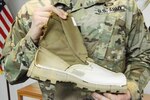 The Army Jungle Combat Boot, now under development, features a low-height heel to prevent snags on things like vines in a jungle environment; additional drainage holes to let water out if it becomes completely soaked, speed laces so that soldiers can don and doff the boots more quickly, a redesigned upper to make the boots less tight when they are new, an insert that helps improve water drainage, a lining that helps the boot breathe better and dry faster; a ballistic fabric-like layer under a soldier's foot to help prevent punctures, and a foam layer between the rubber sole and the upper to provide greater shock absorbing capability. The boot will initially be issued to two full brigade combat teams in Hawaii, part of the 25th Infantry Division, for evaluation. 