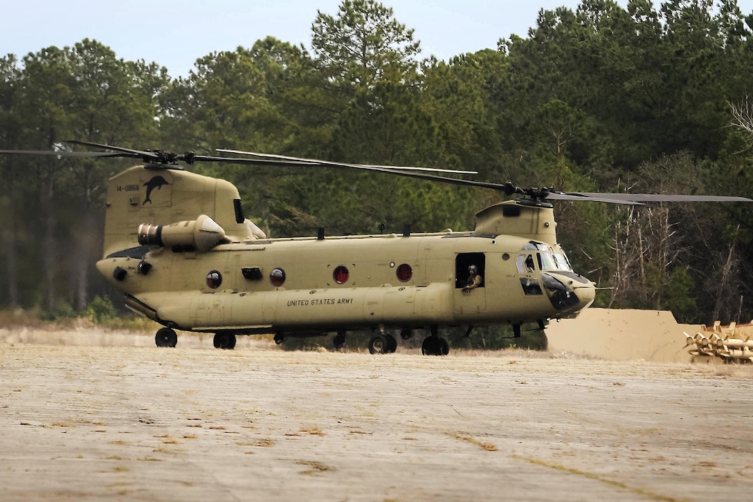 A CH-47 Chinook helicopter prepares to takeoff at Marine Corps Outlying Field Atlantic, N.C., March 2, 2017. The crew is assigned to the 82nd Airborne Division’s 3rd General Support Aviation Battalion, 82nd Combat Aviation Brigade. Army photo by Sgt. Steven Galimore