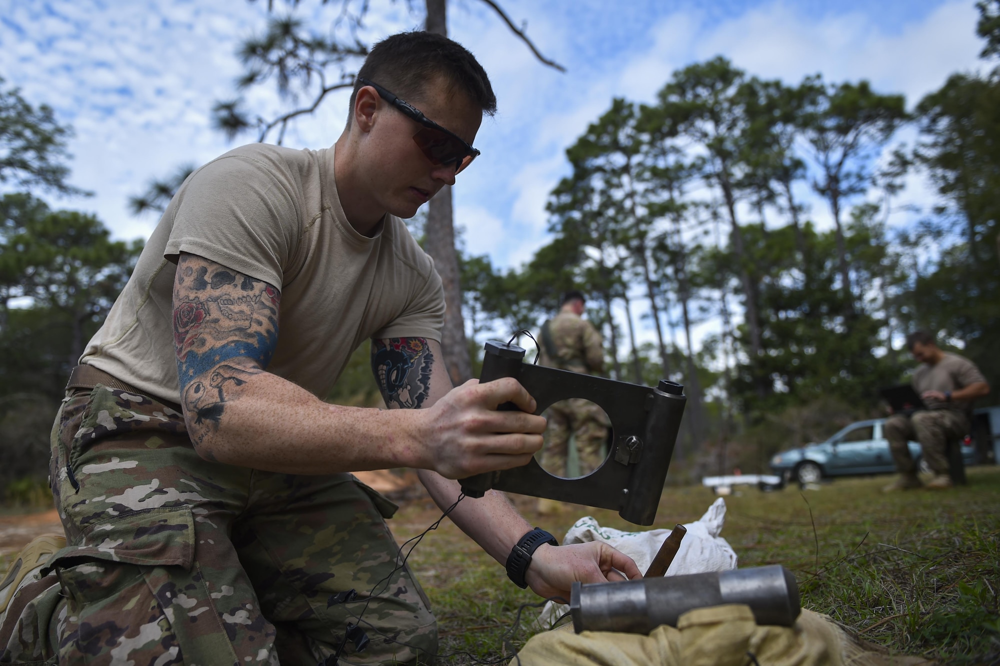 Airman 1st Class Lawrence Gress, an explosive ordinance disposal journeyman with the 1st Special Operations Civil Engineer Squadron, wires an MK1 rocket wrench during EOD tool training at Hurlburt Field, Fla., Mar. 6, 2017. EOD specialists conduct tool training to remain familiar with equipment and ensure operational readiness. (U.S. Air Force photo by Airman 1st Class Joseph Pick)