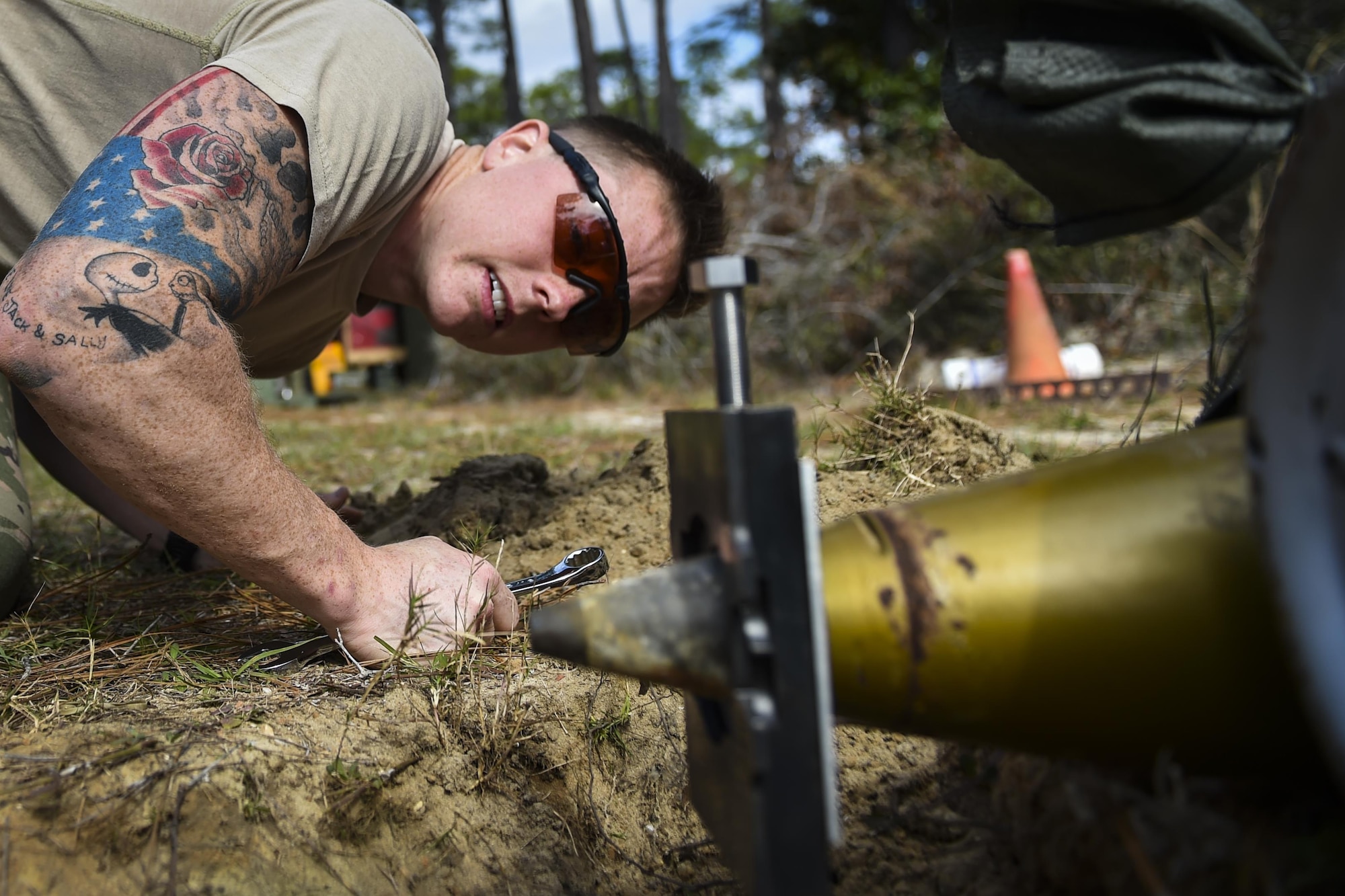 Airman 1st Class Lawrence Gress, an explosive ordinance disposal journeyman with the 1st Special Operations Civil Engineer Squadron, checks the jaw assembly of an MK1 rocket wrench during EOD tool training at Hurlburt Field, Fla., Mar. 6, 2017. If the rocket wrench is not straight, it may not properly remove the fuse and could cause damage to the tool. (U.S. Air Force photo by Airman 1st Class Joseph Pick)