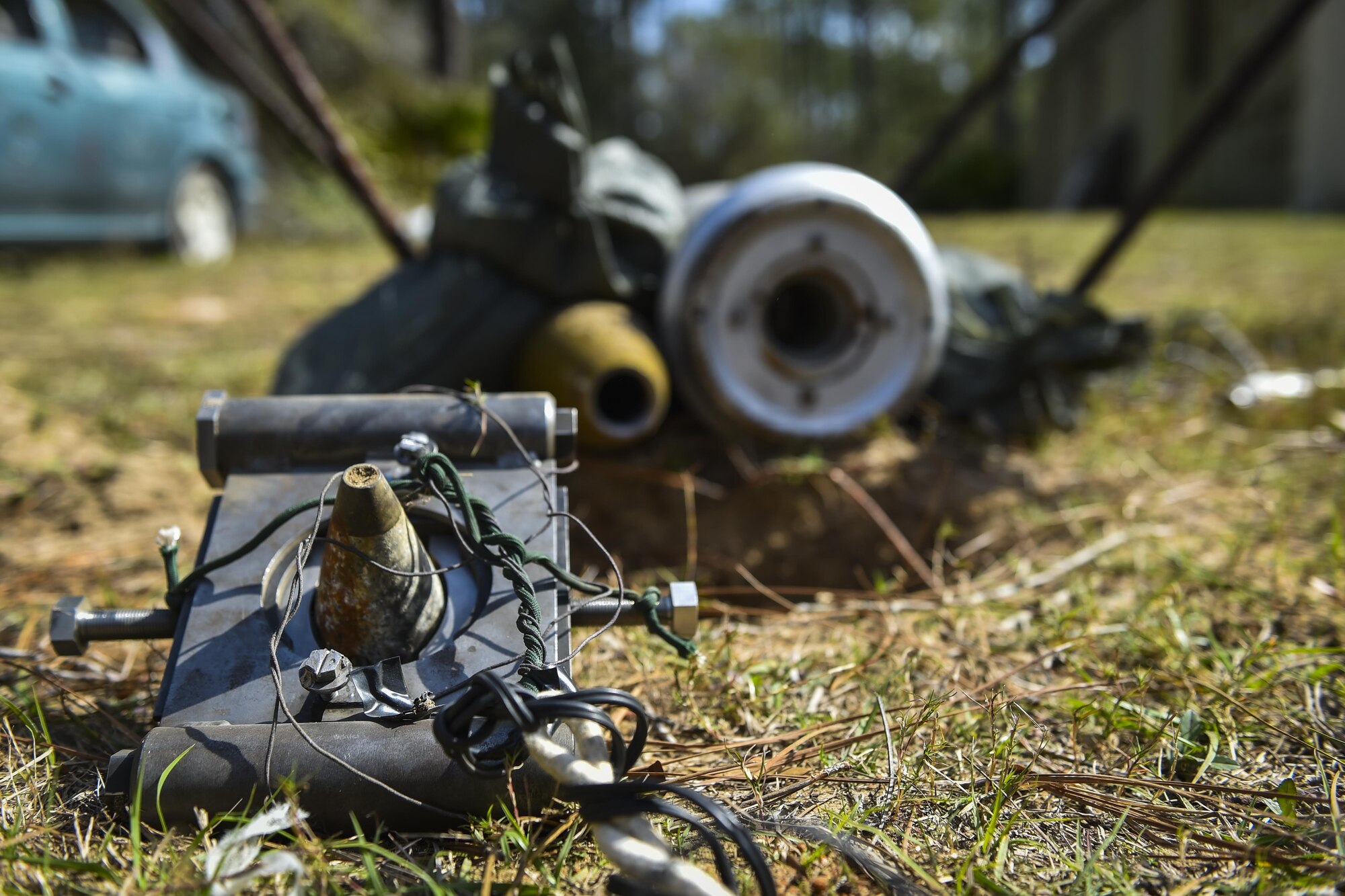 An MK1 rocket wrench removes the fuse of a projectile during EOD tool training at Hurlburt Field, Fla., Mar. 6, 2017. The electrical detonation of the two .50-caliber blank rounds causes the rocket wrench to spin rapidly, removing the fuse attached to the ordnance in the process. (U.S. Air Force photo by Airman 1st Class Joseph Pick)