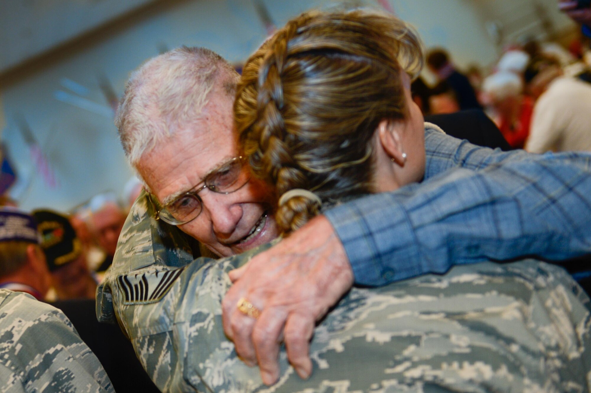 Chief Master Sgt. Teresa Clapper, 2nd Bomb Wing command chief, hugs Thomas Ledford Sr., a retired U.S. Army veteran, during the 38th Annual Veterans’ Luncheon at Barksdale Air Force Base, La., and March, 3, 2017. Ledford, a World War II, Korea and Vietnam veteran, is the third generation of his family to serve in the United States Army. (U.S. Air Force photo/Senior Airman Mozer O. Da Cunha)