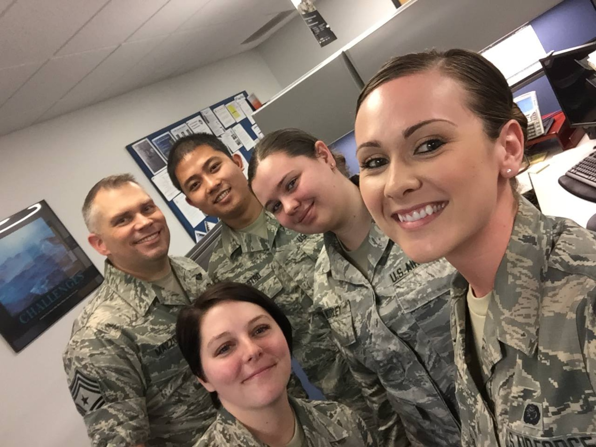 Chief Master Sgt. Tommy Mazzone, Command Chief for Air Force District of Washington, visits with members of the 11th Wing Force Support Squadron Management Team Feb. 24, 2017.