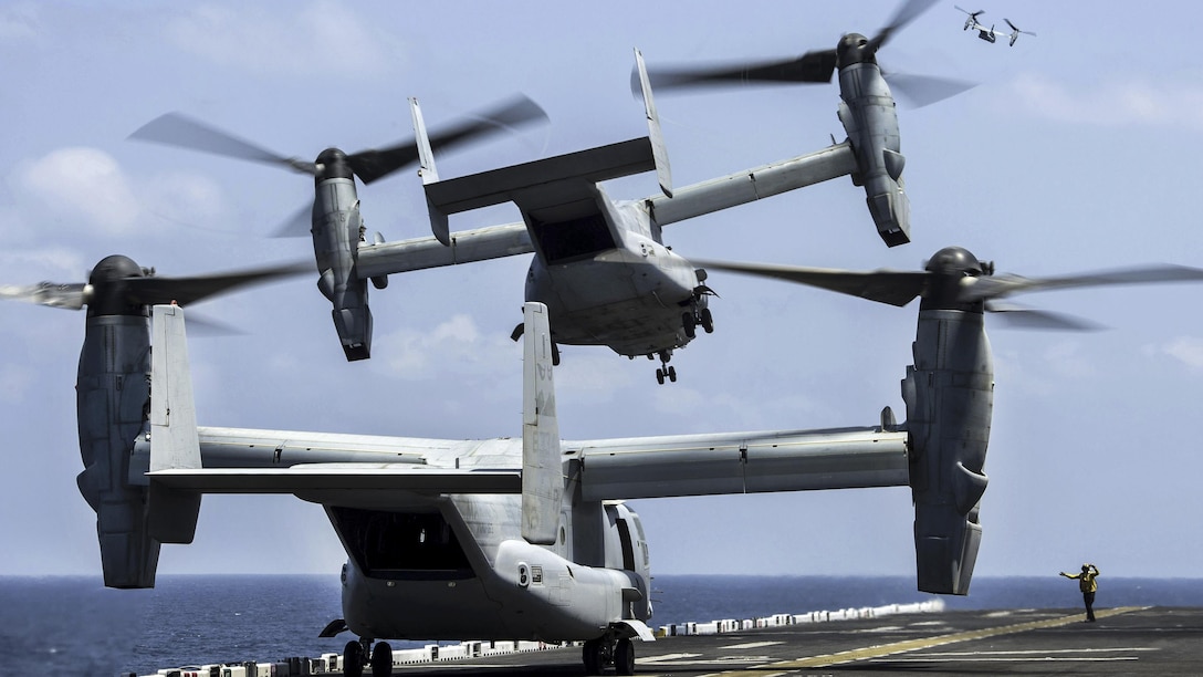 Three MV-22B Ospreys take off from the amphibious assault ship USS Makin Island at sea, March 3, 2017. The pilots are assigned to Marine Medium Tiltrotor Squadron 163. The ship is in the U.S. 5th Fleet area of operations to support maritime security operations to reassure allies and partners, and preserve the freedom of navigation and free flow of regional commerce in the region. Navy photo by Petty Officer 3rd Class Devin M. Langer