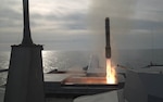 ATLANTIC OCEAN—A Longbow Hellfire Missile is fired from Littoral Combat Ship USS Detroit (LCS 7) on Feb. 28 as part of a structural test firing of the Surface to Surface Missile Module (SSMM). The test marked the first vertical missile launched from an LCS and the first launch of a missile from the SSMM from an LCS. 