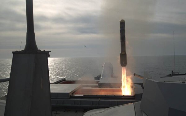 ATLANTIC OCEAN—A Longbow Hellfire Missile is fired from Littoral Combat Ship USS Detroit (LCS 7) on Feb. 28 as part of a structural test firing of the Surface to Surface Missile Module (SSMM). The test marked the first vertical missile launched from an LCS and the first launch of a missile from the SSMM from an LCS. 