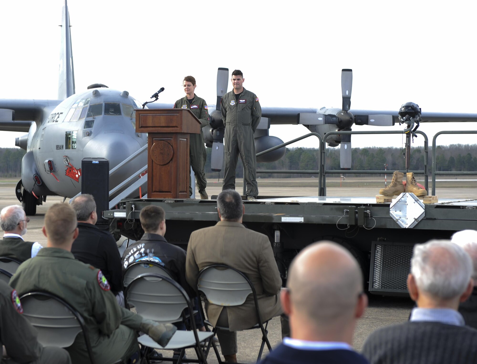 U.S. Air Force Lt. Col. Sarah Santoro, 41st Airlift Squadron Commander, speaks to current and former members of the squadron during a reunion March 24, 2017, at the flightline on Little Rock Air Force Base, Ark. The celebration honored of the 75th anniversary of the 41st AS. (U.S. Air Force photo by Airman 1st Class Grace Nichols)