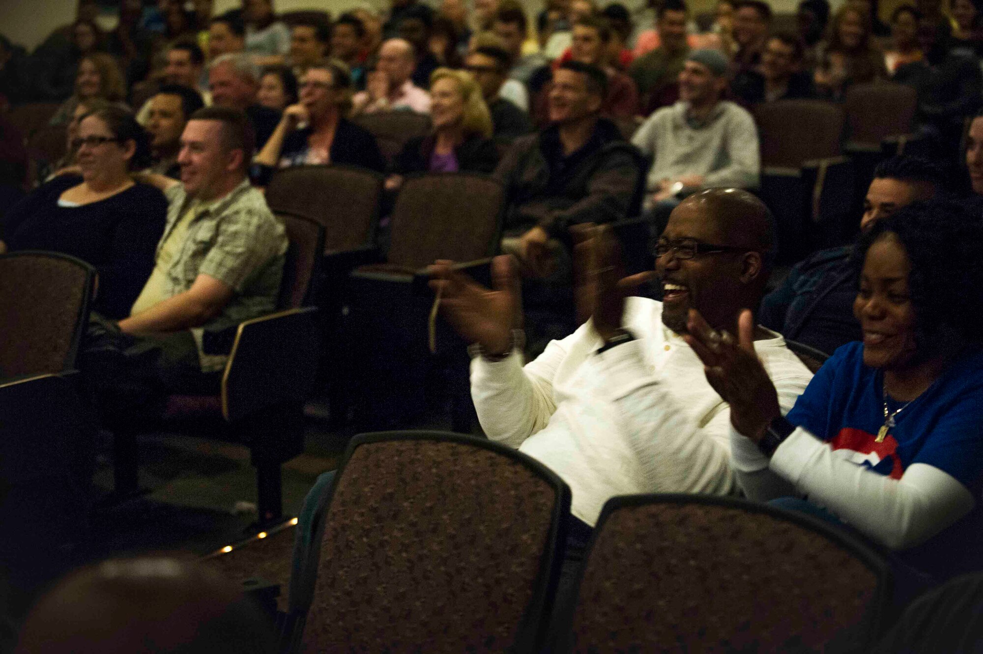 Air Commandos and their families attend a comedy show featuring Walter Campbell and Ben Bailey at the King Auditorium on Hurlburt Field, Fla., March 3, 2017. The 1st Special Operations Force Support Squadron, in conjunction with Air Forces Services Agency, hosted the free event to invest in the resiliency of the force and family. (U.S. Air Force photo by Airman 1st Class Isaac O. Guest IV)