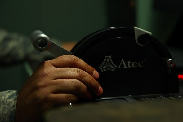 U.S. Air Force Staff Sgt. Dale Rodgers, 20th Component Maintenance Squadron aerospace propulsion craftsman, holds the throttle for an F-16CM Fighting Falcon engine at a test cell facility at Shaw Air Force Base, S.C., March 3, 2017. The throttle controls the engine being tested and can quickly shut the engine down in case of an emergency. (U.S. Air Force photo by Airman 1st Class Kathryn R.C. Reaves)
